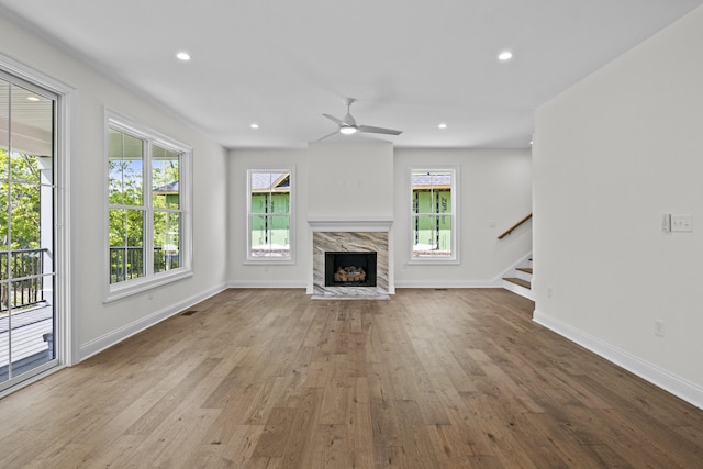 3521 Harper Woods Ln, Lexington, KY 40515 - unfurnished living room with stairs, hardwood / wood-style floors, baseboards, and recessed lighting