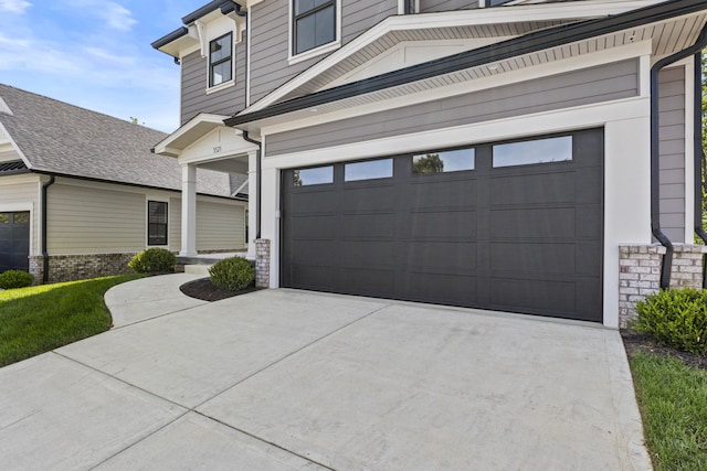 3521 Harper Woods Ln, Lexington, KY 40515 - view of front of home with driveway, an attached garage, and brick siding