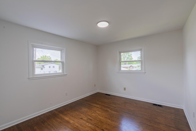 1613 Hastings Ct, Lexington, KY 40505 - spare room featuring baseboards and dark wood finished floors