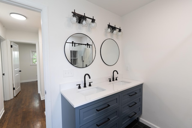 1613 Hastings Ct, Lexington, KY 40505 - full bath featuring double vanity, baseboards, and wood finished floors