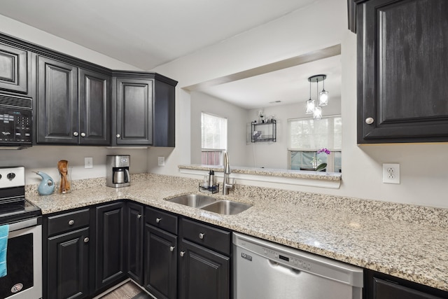 1748 Chandler Ln, Lexington, KY 40504 - kitchen featuring appliances with stainless steel finishes, a sink, dark cabinetry, and light stone counters
