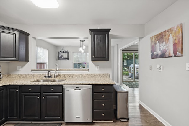 1748 Chandler Ln, Lexington, KY 40504 - kitchen featuring dishwasher, a sink, wood finished floors, dark cabinets, and baseboards