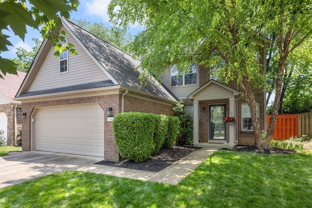 1748 Chandler Ln, Lexington, KY 40504 - view of front of house featuring a garage, concrete driveway, and brick siding
