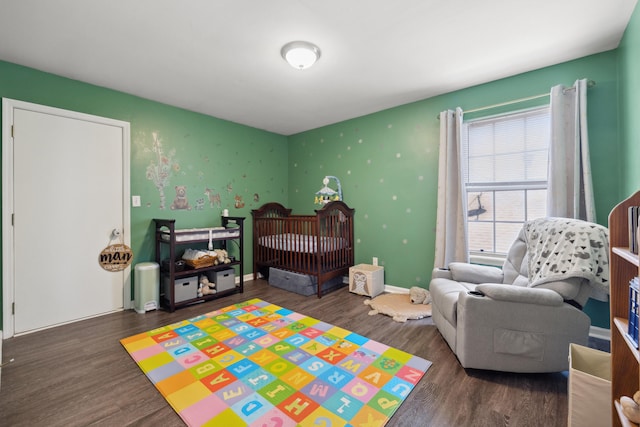 1748 Chandler Ln, Lexington, KY 40504 - bedroom with wood finished floors, a nursery area, and baseboards