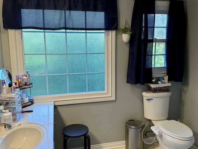 4516 Clubhouse Dr, Lexington, KY 40514 - bathroom featuring a sink, toilet, and baseboards