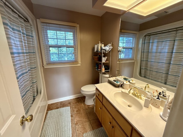 4516 Clubhouse Dr, Lexington, KY 40514 - full bath with toilet, vanity, tile patterned flooring, baseboards, and shower / tub combo with curtain