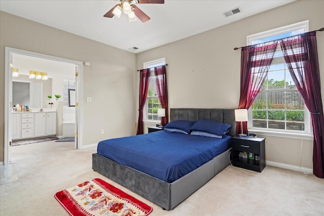 2713 Ella Rae Ct, Lexington, KY 40511 - carpeted bedroom featuring baseboards, ensuite bath, and a ceiling fan