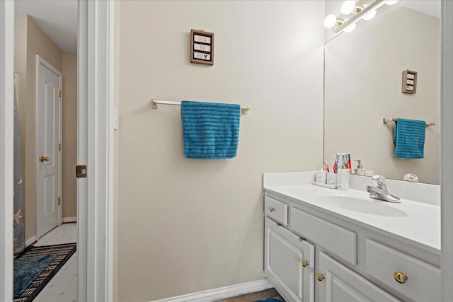2713 Ella Rae Ct, Lexington, KY 40511 - bathroom with vanity, baseboards, and tile patterned flooring