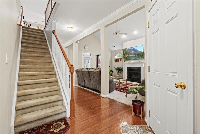 2713 Ella Rae Ct, Lexington, KY 40511 - foyer entrance with wood-type flooring, stairs, ceiling fan, ornamental molding, and a fireplace