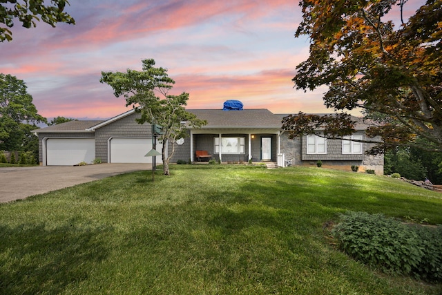 1636 Green Hill Estates Rd, Monticello, KY 42633 - ranch-style house with a garage, concrete driveway, and a front yard