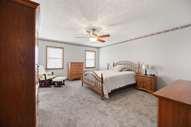 1636 Green Hill Estates Rd, Monticello, KY 42633 - bedroom featuring light colored carpet, a textured ceiling, and a ceiling fan