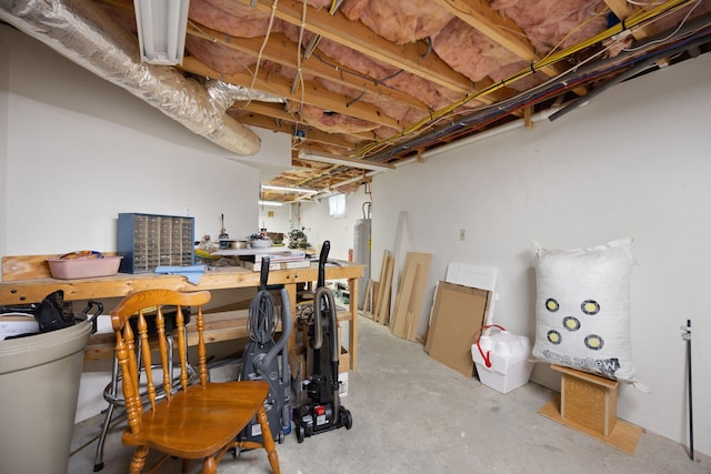 1636 Green Hill Estates Rd, Monticello, KY 42633 - unfinished basement featuring a workshop area and water heater