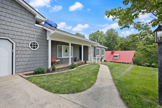 1636 Green Hill Estates Rd, Monticello, KY 42633 - property entrance featuring covered porch and a lawn