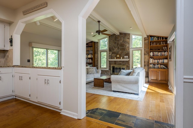 301 Atwood Dr, Lexington, KY 40515 - living area featuring hardwood / wood-style floors, ceiling fan, and a stone fireplace