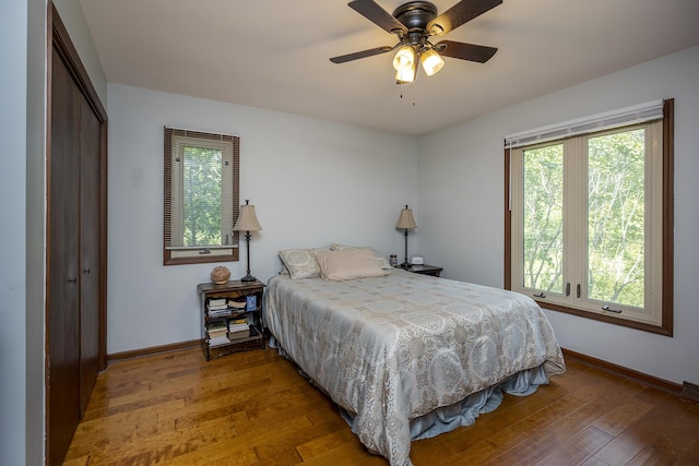 301 Atwood Dr, Lexington, KY 40515 - bedroom featuring baseboards, wood-type flooring, a closet, and a ceiling fan