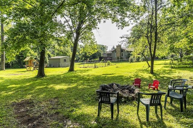 301 Atwood Dr, Lexington, KY 40515 - view of yard featuring a fire pit and a playground