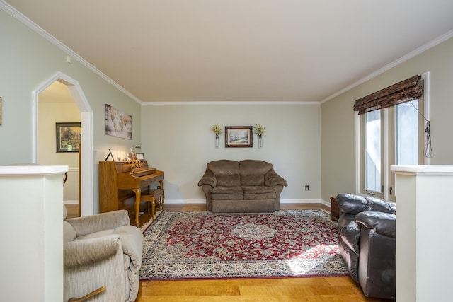 301 Atwood Dr, Lexington, KY 40515 - living area with crown molding, light wood-style flooring, arched walkways, and baseboards