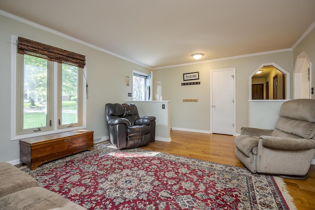 301 Atwood Dr, Lexington, KY 40515 - living room featuring wood finished floors, ornamental molding, baseboards, and arched walkways