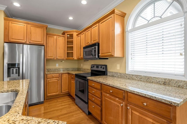 3765 Ridge View Way, Lexington, KY 40509 - kitchen featuring range with electric stovetop, black microwave, stainless steel fridge with ice dispenser, light wood-style flooring, and ornamental molding