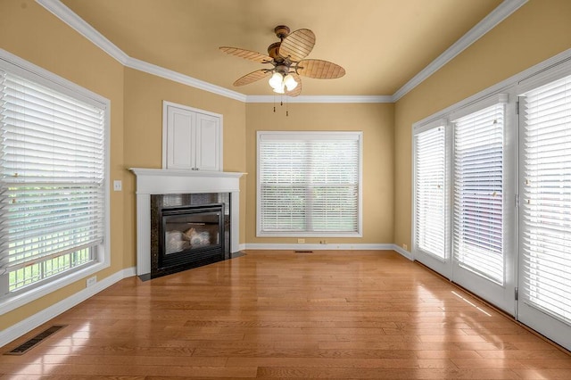 3765 Ridge View Way, Lexington, KY 40509 - unfurnished living room with light wood-type flooring, ornamental molding, a ceiling fan, a fireplace with flush hearth, and baseboards
