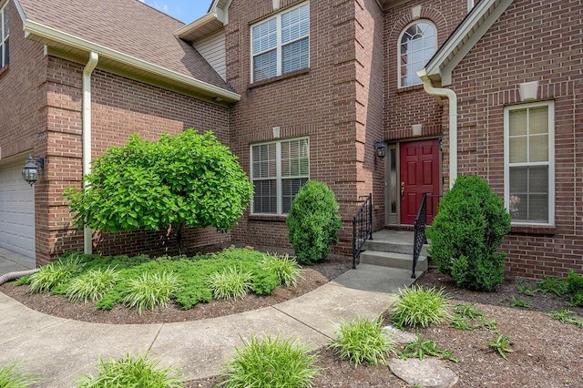 3765 Ridge View Way, Lexington, KY 40509 - entrance to property featuring brick siding, roof with shingles, and a garage