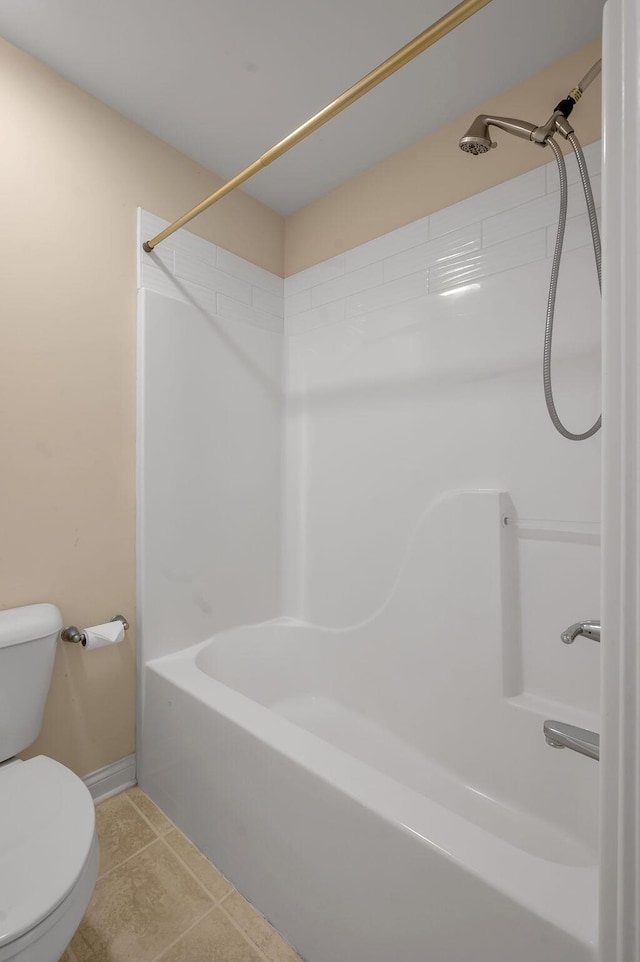 3765 Ridge View Way, Lexington, KY 40509 - bathroom with washtub / shower combination, toilet, tile patterned floors, and baseboards