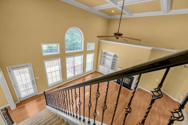 3765 Ridge View Way, Lexington, KY 40509 - staircase with a high ceiling, coffered ceiling, a ceiling fan, crown molding, and beamed ceiling