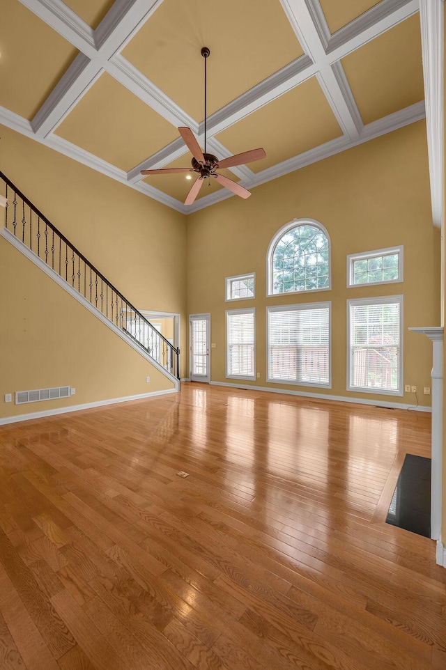 3765 Ridge View Way, Lexington, KY 40509 - unfurnished living room with coffered ceiling, ceiling fan, wood finished floors, baseboards, and beam ceiling