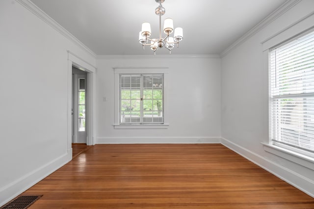 109 N Ashland Ave, Lexington, KY 40502 - empty room featuring a chandelier, light wood-type flooring, ornamental molding, and baseboards