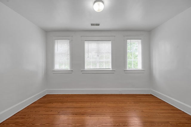 109 N Ashland Ave, Lexington, KY 40502 - unfurnished room featuring hardwood / wood-style floors and baseboards