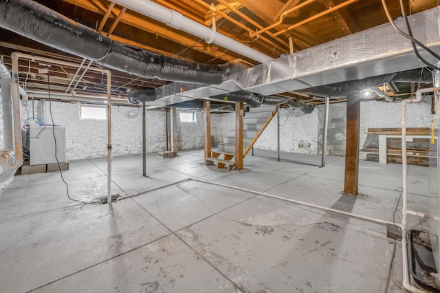 109 N Ashland Ave, Lexington, KY 40502 - basement featuring washer / dryer and stairway