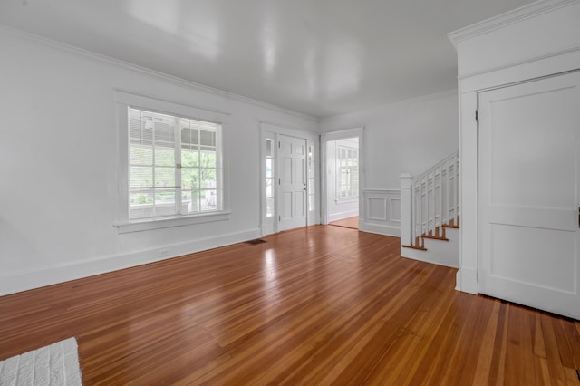 109 N Ashland Ave, Lexington, KY 40502 - foyer featuring stairs, wood finished floors, and ornamental molding