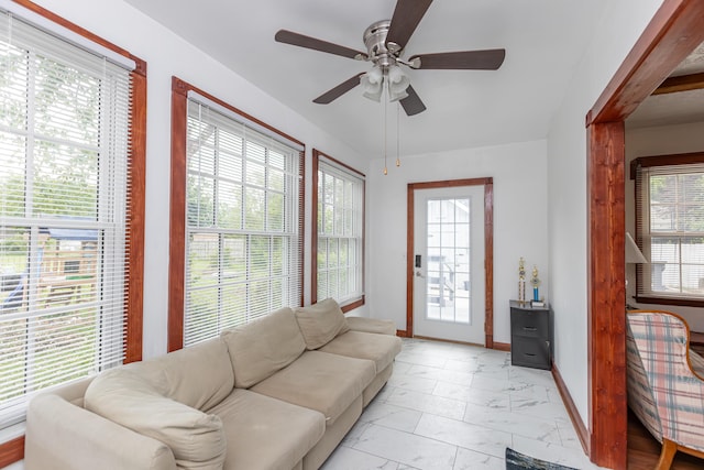 645 Raven Dr, Frankfort, KY 40601 - living area featuring light marble finish flooring, ceiling fan, and baseboards