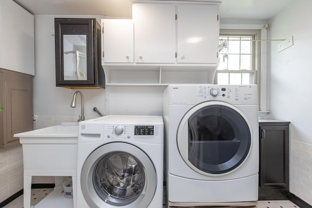 645 Raven Dr, Frankfort, KY 40601 - washroom featuring washer and clothes dryer and cabinet space