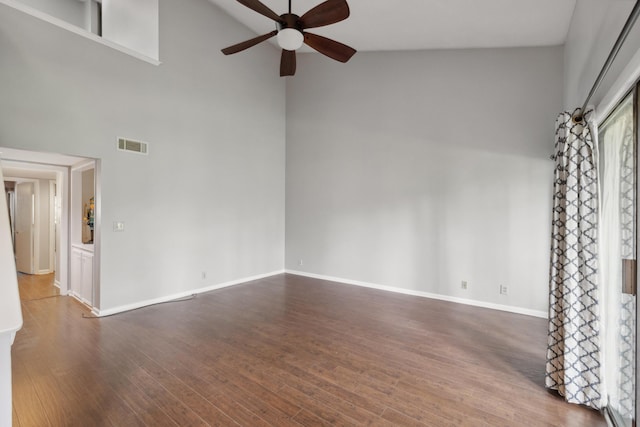 750 Shaker Dr Unit 907, Lexington, KY 40504 - unfurnished living room with ceiling fan, high vaulted ceiling, wood finished floors, and baseboards