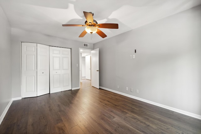 750 Shaker Dr Unit 907, Lexington, KY 40504 - unfurnished bedroom featuring baseboards, dark wood-style floors, a closet, and ceiling fan