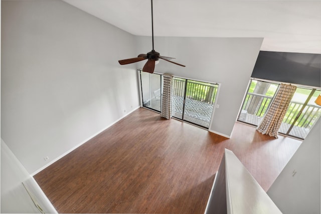 750 Shaker Dr Unit 907, Lexington, KY 40504 - unfurnished living room with ceiling fan, baseboards, wood finished floors, and high vaulted ceiling