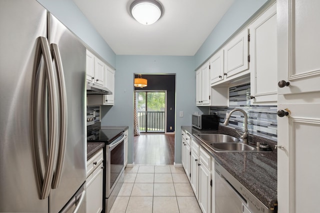 750 Shaker Dr Unit 907, Lexington, KY 40504 - kitchen with appliances with stainless steel finishes, a sink, under cabinet range hood, backsplash, and white cabinetry