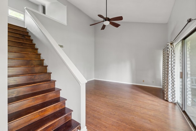 750 Shaker Dr Unit 907, Lexington, KY 40504 - stairs with ceiling fan, wood finished floors, baseboards, and high vaulted ceiling