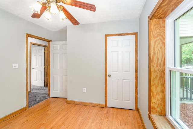 2200 Kays Branch Rd, Owenton, KY 40359 - unfurnished bedroom featuring light wood finished floors, baseboards, and ceiling fan