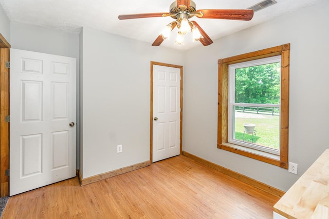 2200 Kays Branch Rd, Owenton, KY 40359 - unfurnished bedroom with light wood-type flooring, baseboards, and ceiling fan