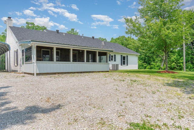 2200 Kays Branch Rd, Owenton, KY 40359 - back of house with a sunroom, cooling unit, a chimney, a carport, and roof with shingles