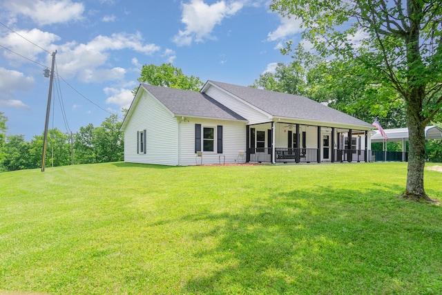 2200 Kays Branch Rd, Owenton, KY 40359 - view of front of house with a front yard, a shingled roof, ceiling fan, and a detached carport