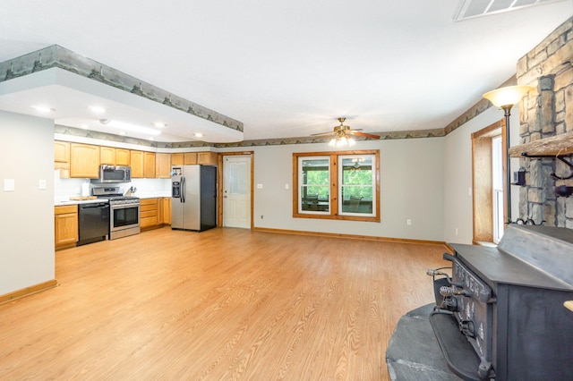 2200 Kays Branch Rd, Owenton, KY 40359 - kitchen featuring stainless steel appliances, light wood-style flooring, a ceiling fan, light countertops, and baseboards