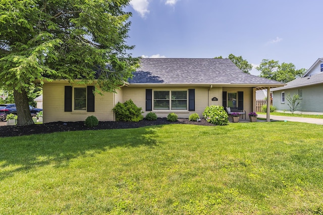 235 W Vista St, Lexington, KY 40503 - ranch-style home featuring a front lawn and a shingled roof