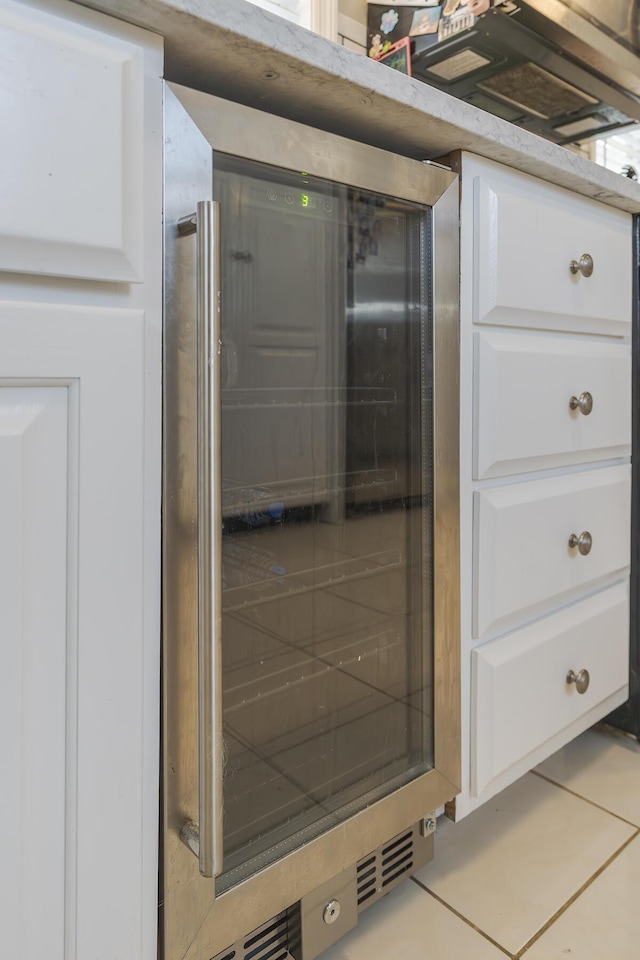 235 W Vista St, Lexington, KY 40503 - kitchen view of white cabinetry and beverage cooler