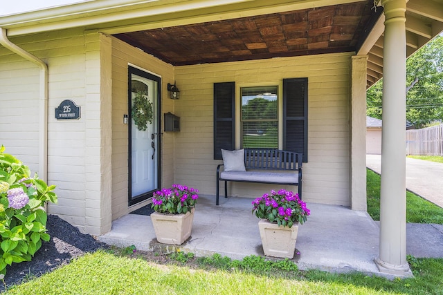 235 W Vista St, Lexington, KY 40503 - view of exterior entry with a porch and concrete block siding