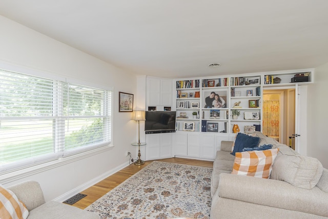 235 W Vista St, Lexington, KY 40503 - living room featuring light wood-style floors and baseboards