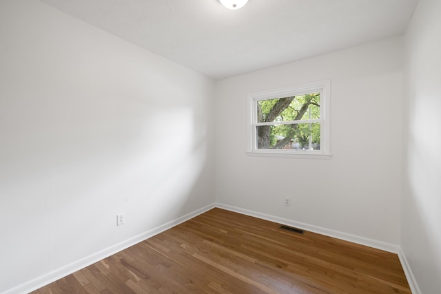 289 Mulberry Ct, Lexington, KY 40509 - unfurnished room featuring baseboards and wood finished floors
