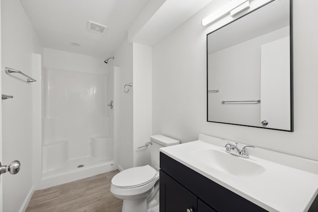 289 Mulberry Ct, Lexington, KY 40509 - full bath featuring vanity, toilet, wood finished floors, and baseboards